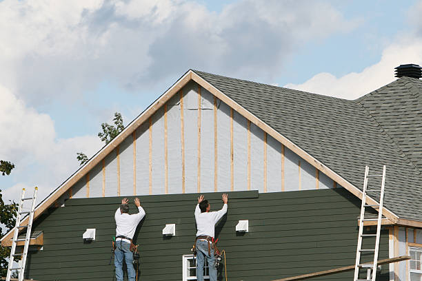Professional Siding Installation technician working in Snellville, GA